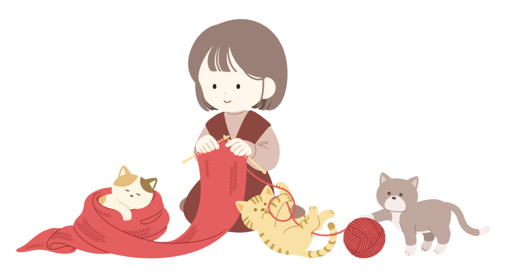毛糸を編む人と毛糸で遊ぶ猫たち